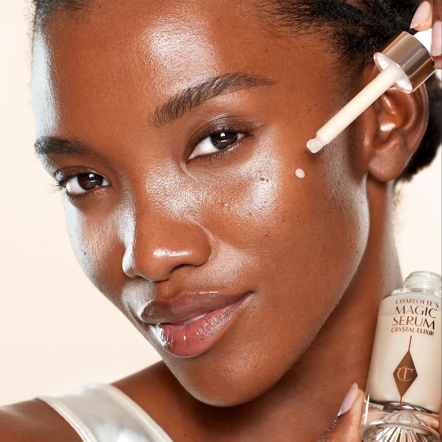 Charlotte Tilbury Magic Serum Crystal Elixir - Anti Aging Skincare Set - Face Firming Peptide, Brightening Vitamin C Serum & Glow-Boosting Niacinamide - Perfect for Gifting & Makeup Pairings (100ml)